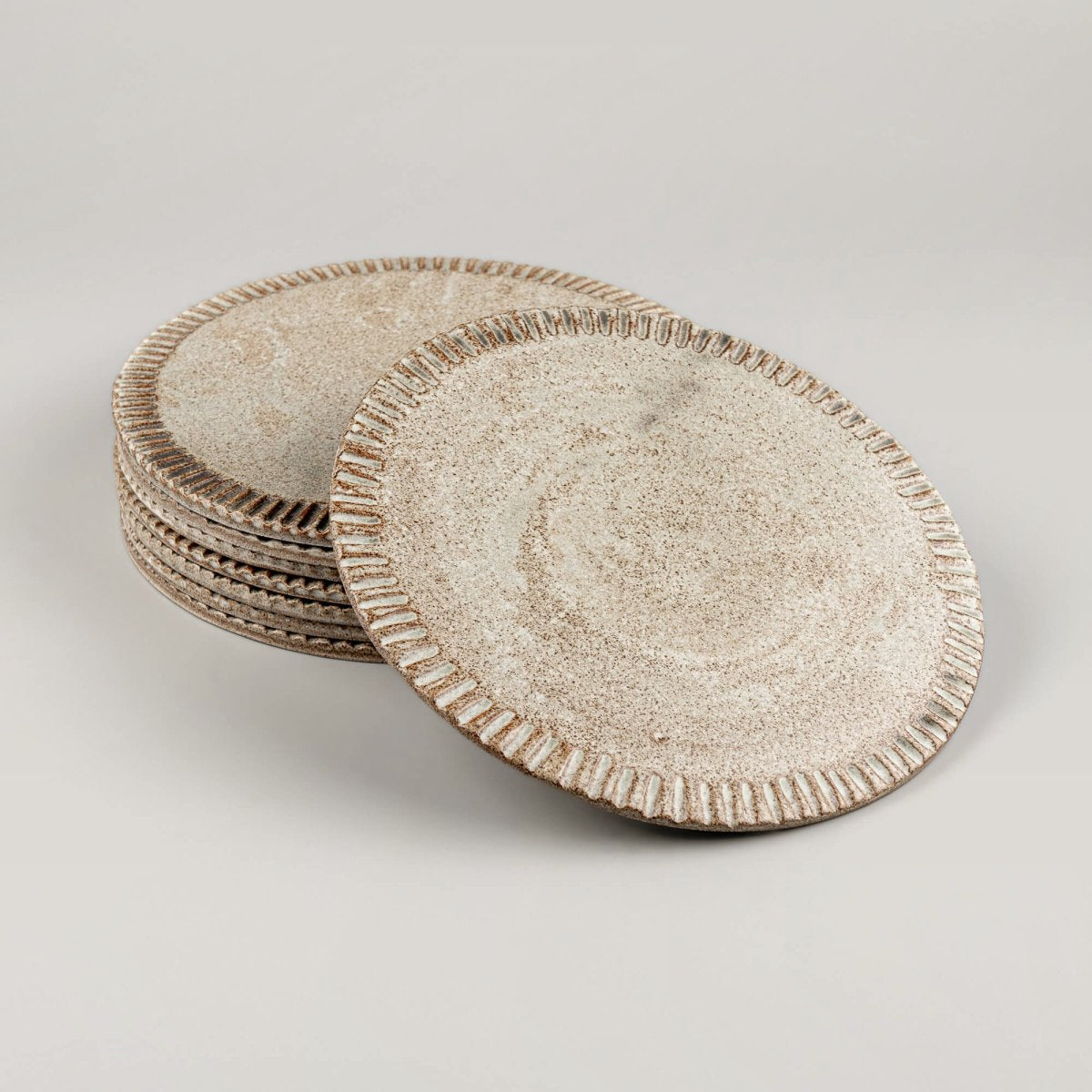 Two handcrafted ceramic plates for boutique hotels and culinary presentation.