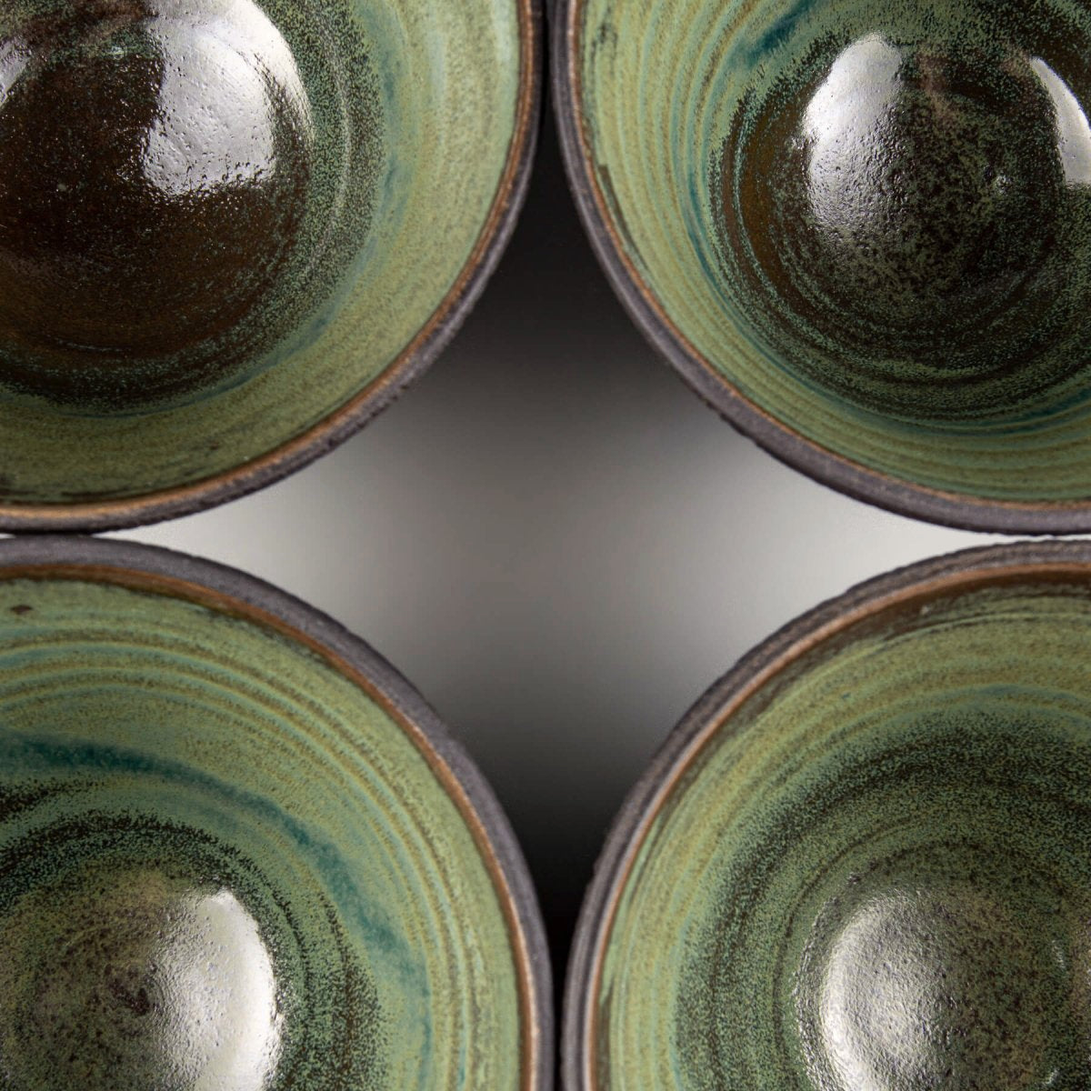 Interior view of artisan pottery bowls used for stylish home dining decor.