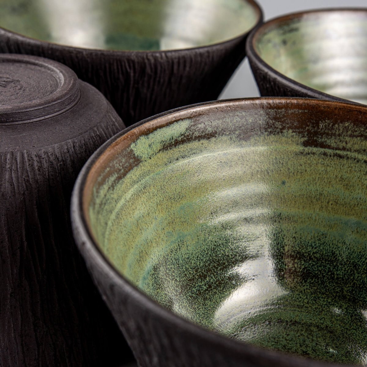 Handcrafted green-glazed bowl ideal for culinary presentation and luxury gift ideas.