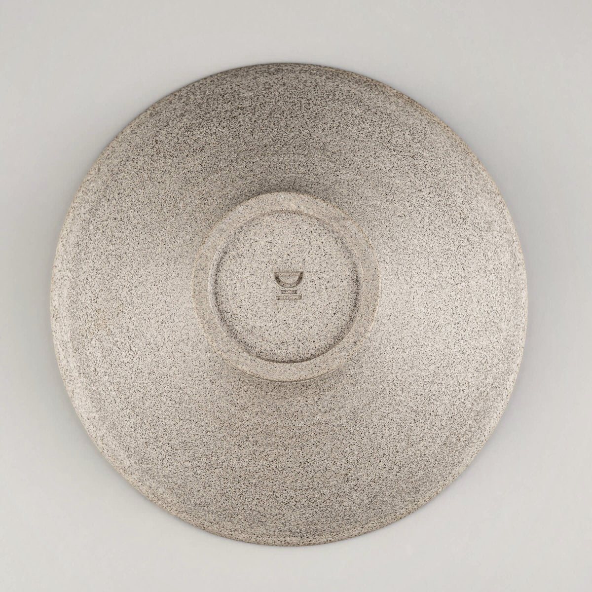 Flat top view of stoneware bowl showing spiral center and balanced proportions.