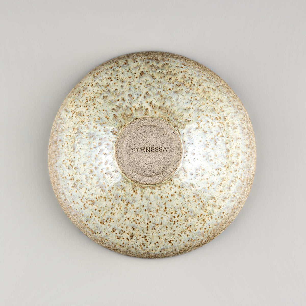 Handmade ceramic bowls with matching finishes, ideal for artisan tableware sets with Stonessa logo.