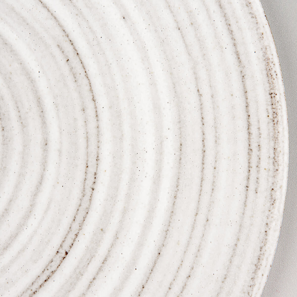 Modern handcrafted ceramic plate designed for fine dining table presentations.