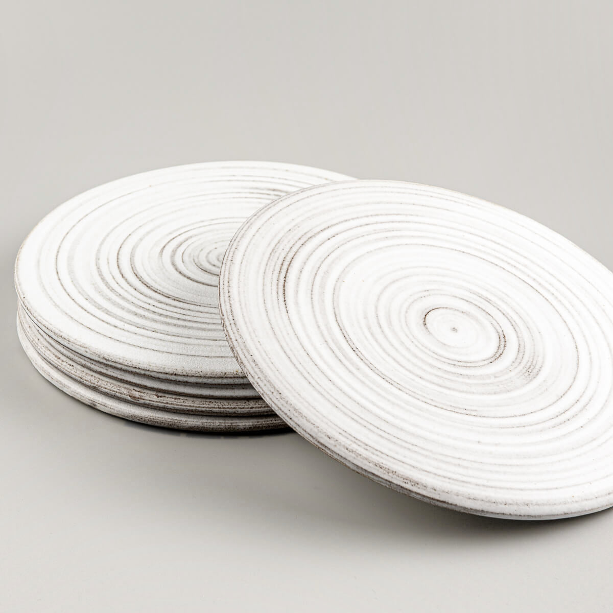 Elegant handmade ceramic plates perfect for boutique hotels and curated tables.