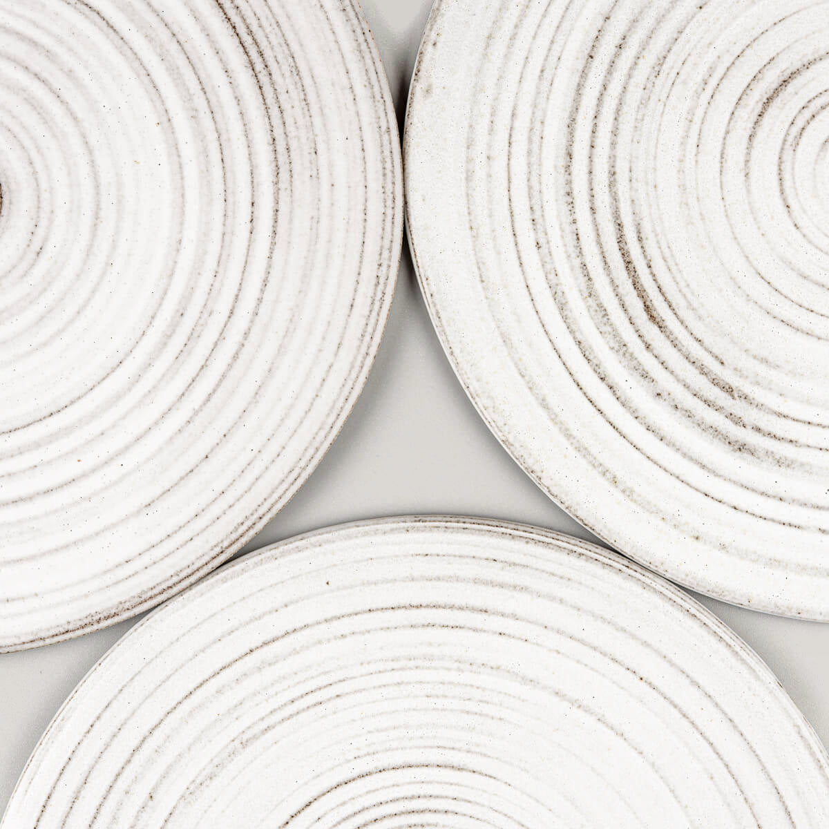 Elegant handmade ceramic plates perfect for boutique hotels and curated tables.