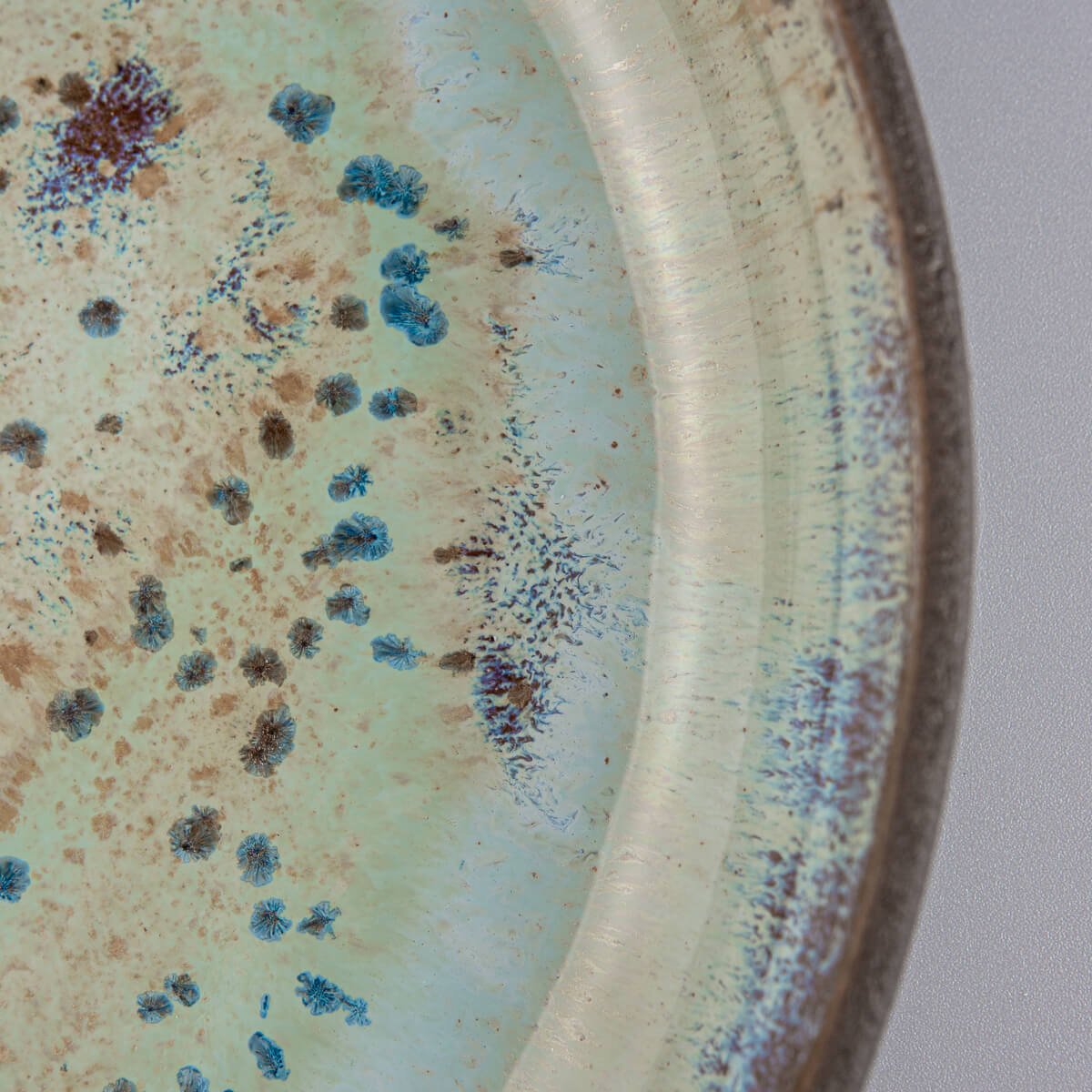 Hand-glazed ceramic plate ideal for boutique hotels and culinary presentation.