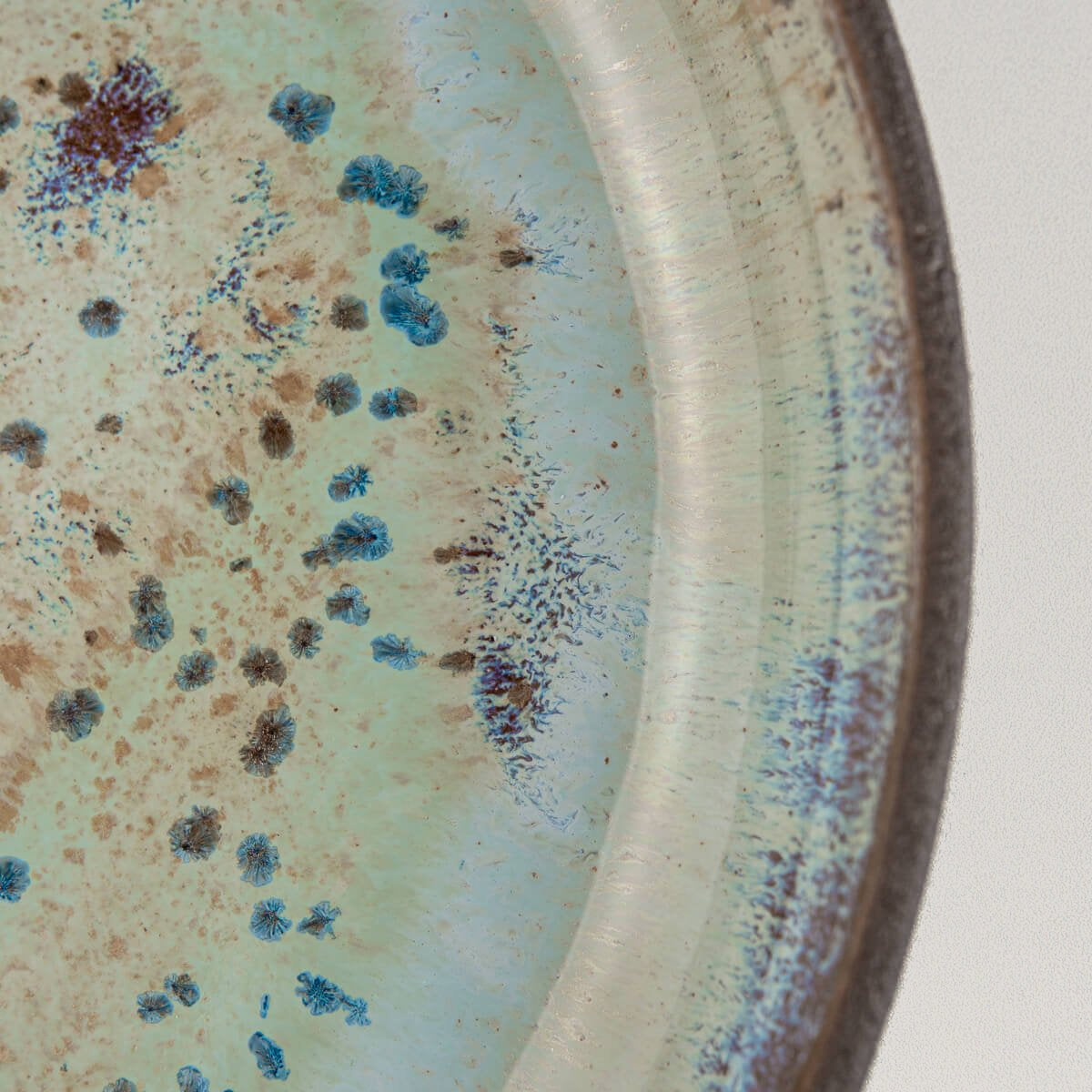 Hand-glazed ceramic plate ideal for boutique hotels and culinary presentation.
