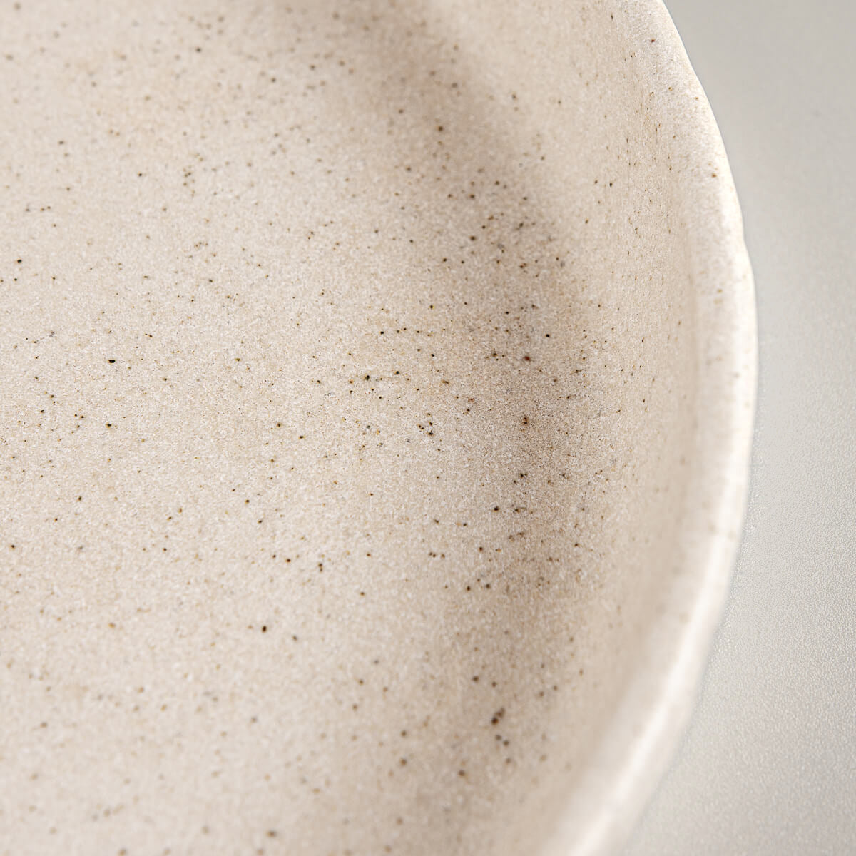 Organic beige clay plate for dessert, collectible tableware for gifting.