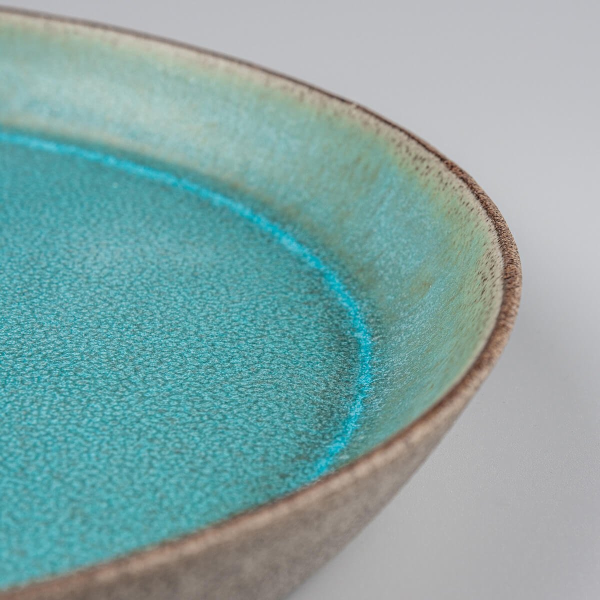 Handmade ceramic plate perfect for chefs, homes, and interior design lovers.