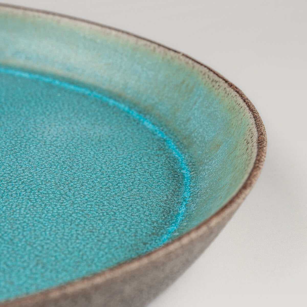 Handmade ceramic plate perfect for chefs, homes, and interior design lovers.