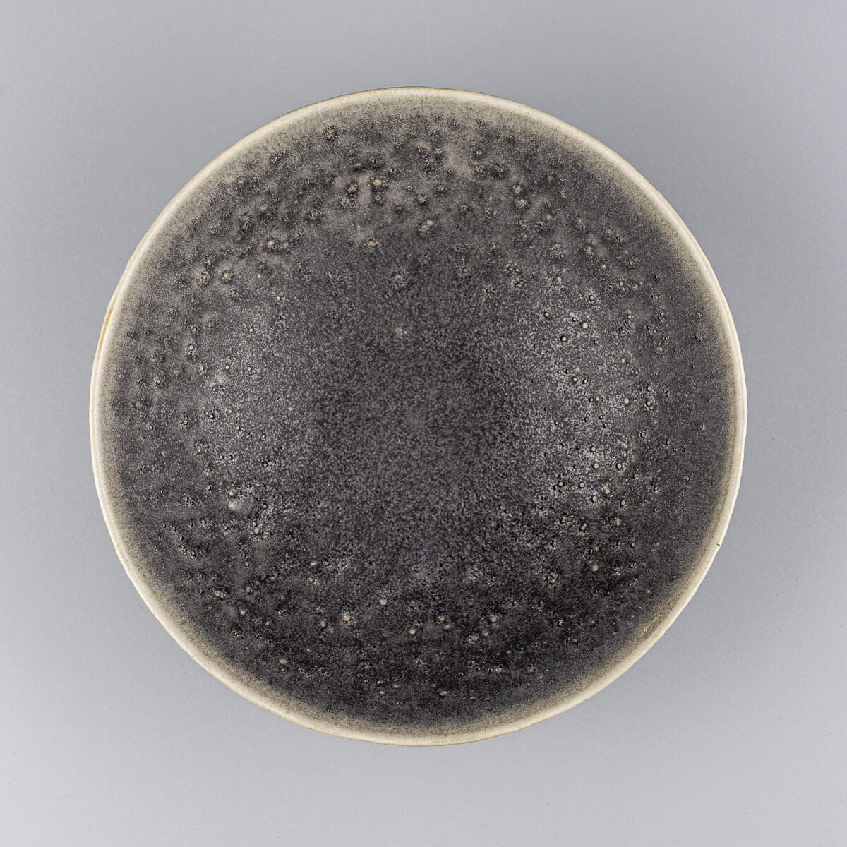 Top view of handcrafted custom ceramic bowl showing glazed interior and gently sloped rim.