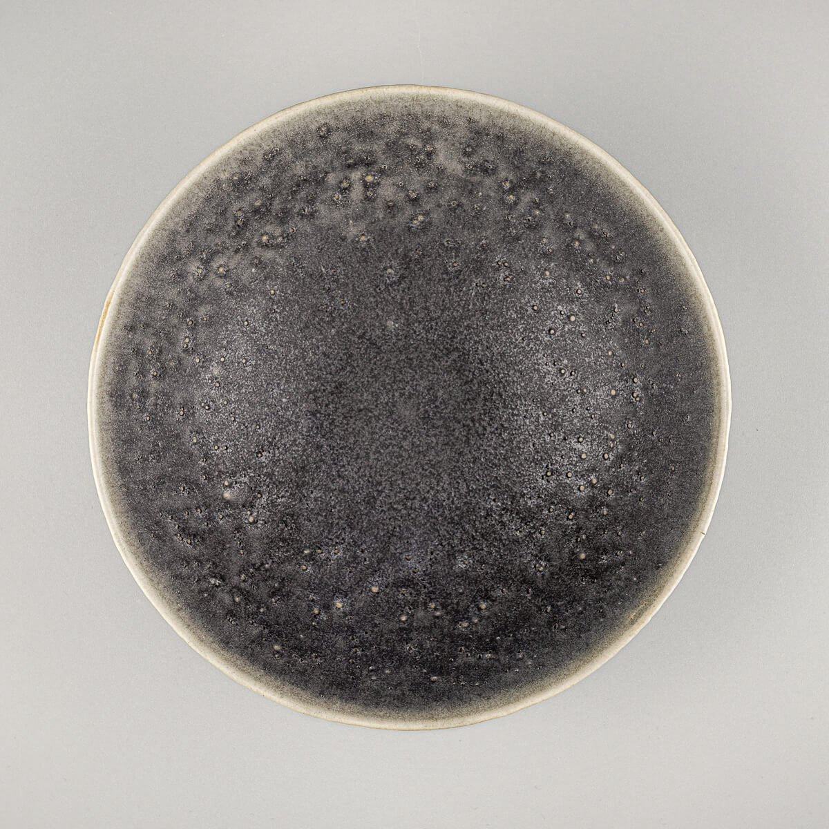 Top view of handcrafted custom ceramic bowl showing glazed interior and gently sloped rim.