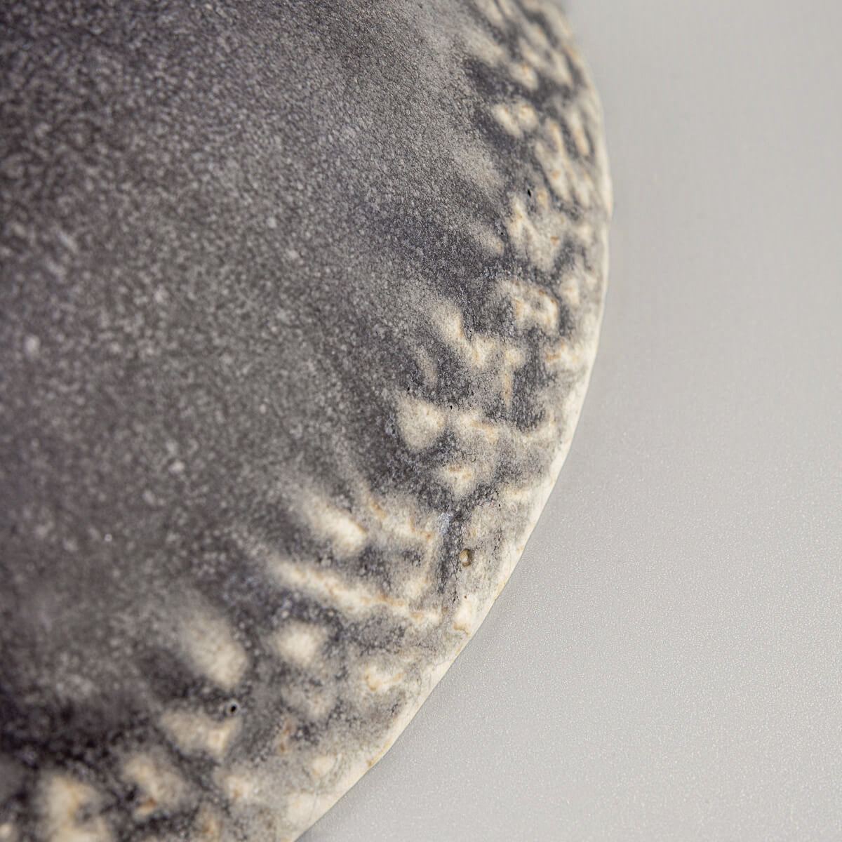 Organic glaze finish on handcrafted bowl showing stoneware craftsmanship.