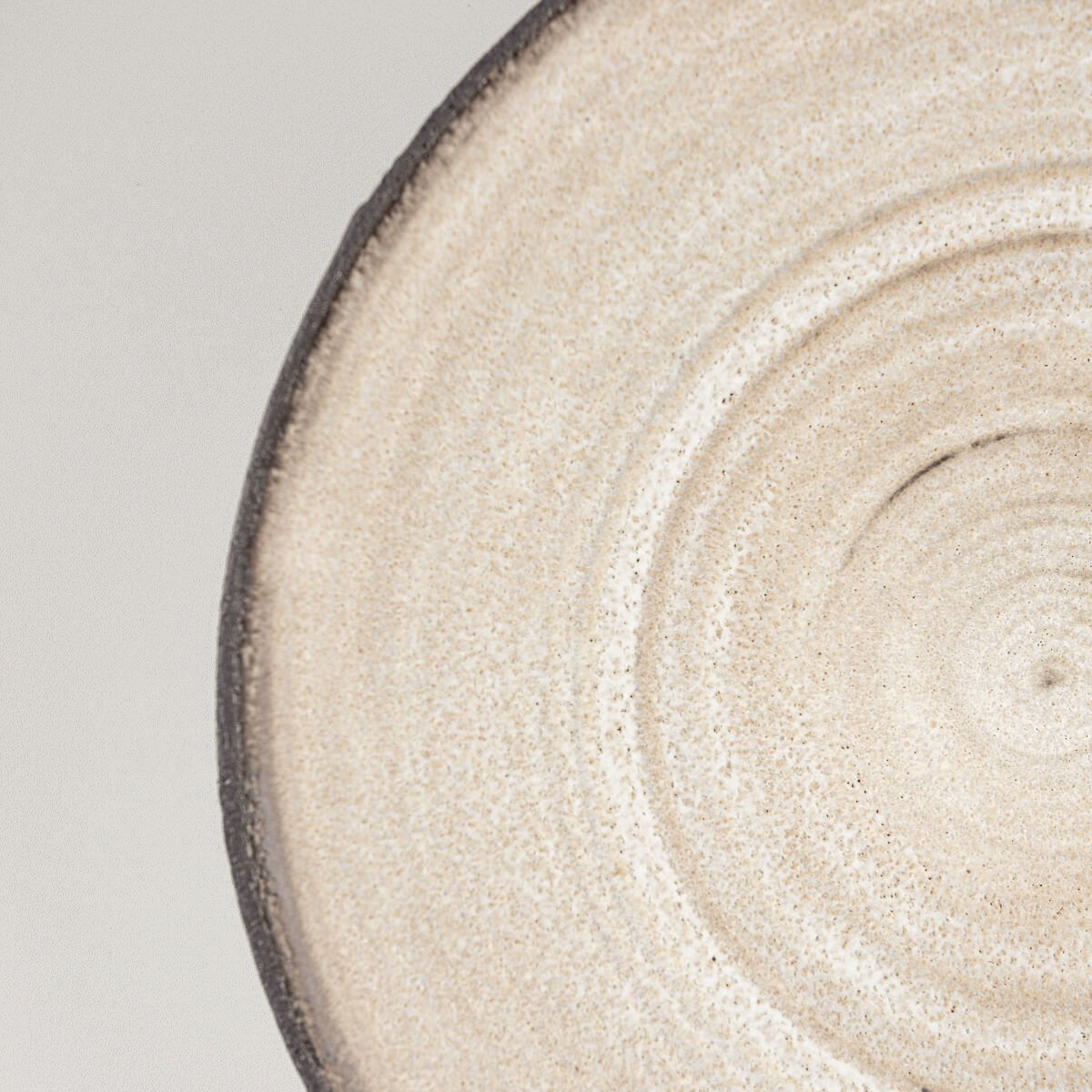 Detail showing smooth transition between glazed interior and unglazed exterior.