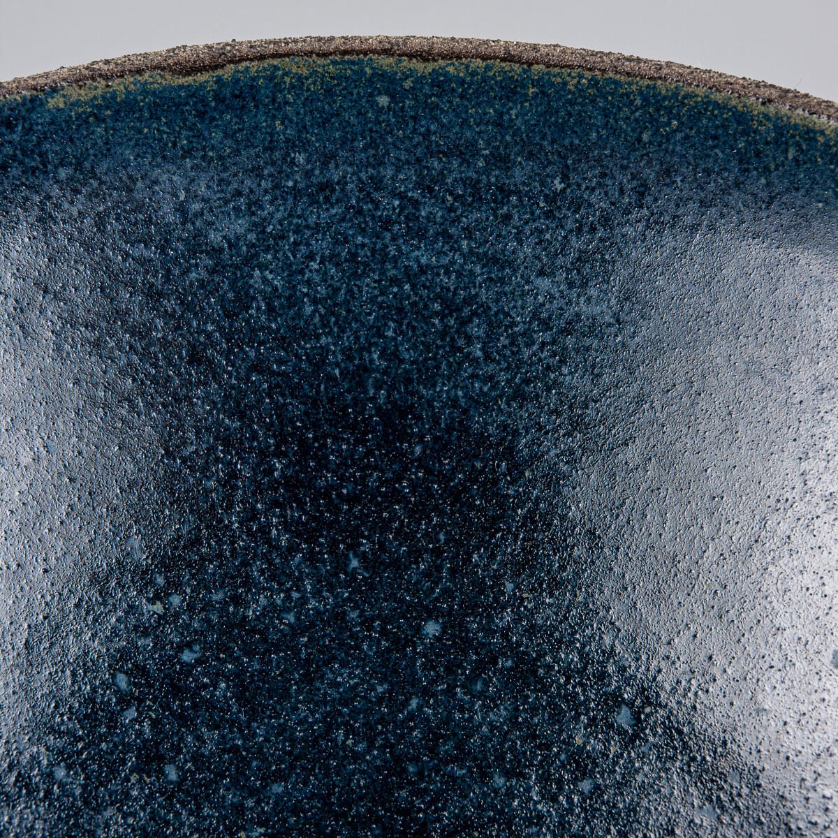 Interior glaze detail showing color depth and craftsmanship of handmade bowl.