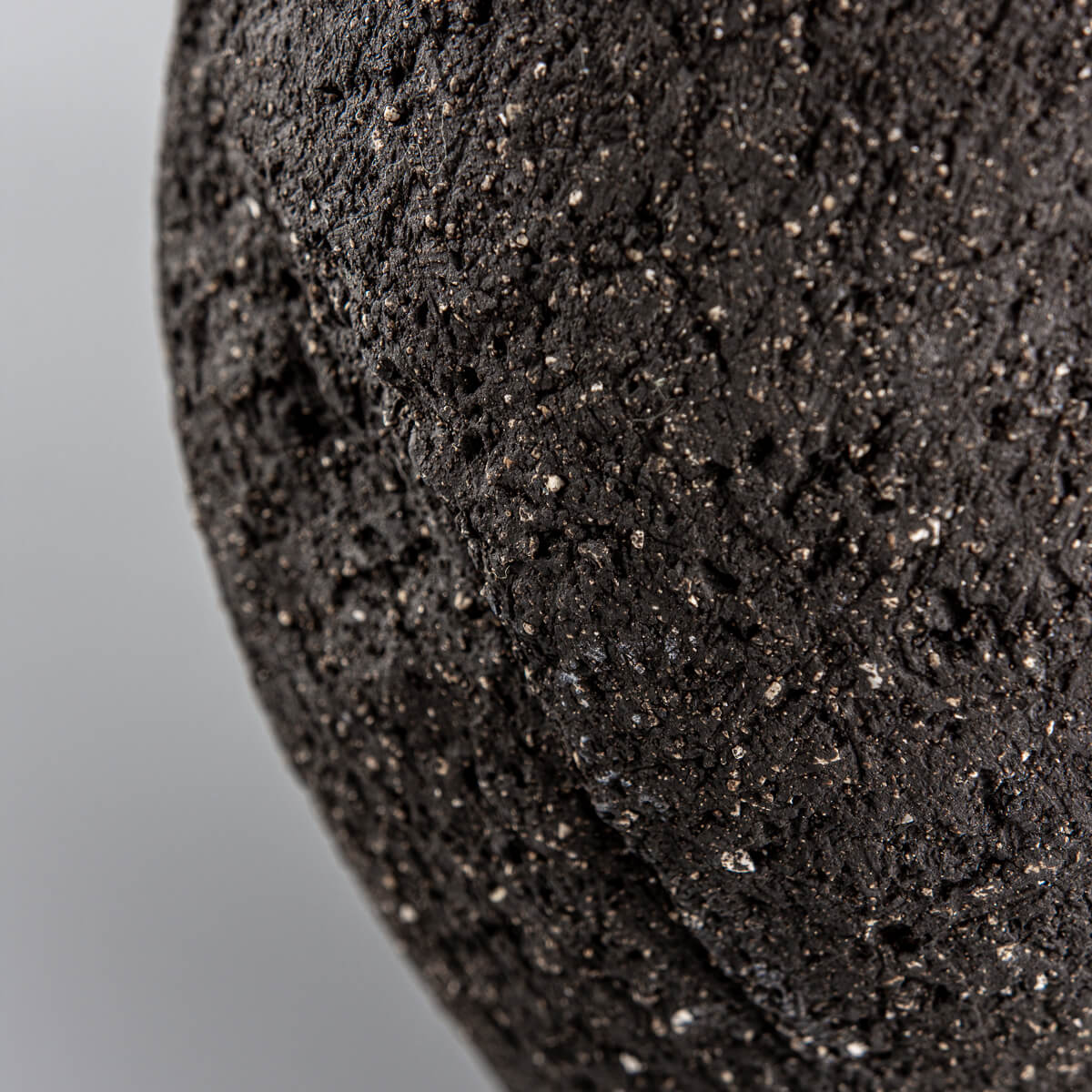 Top view of pottery vase handmade with organic textured surface for luxury home and hotel decor.