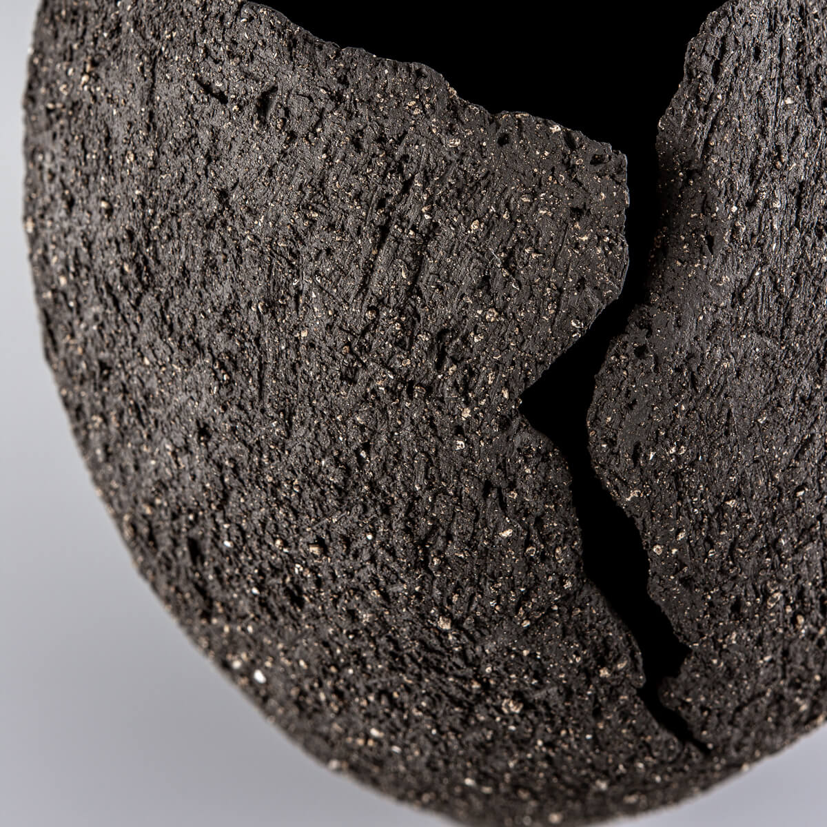 Luxury pottery vase with volcanic crack detail, perfect as collectible handmade decor.