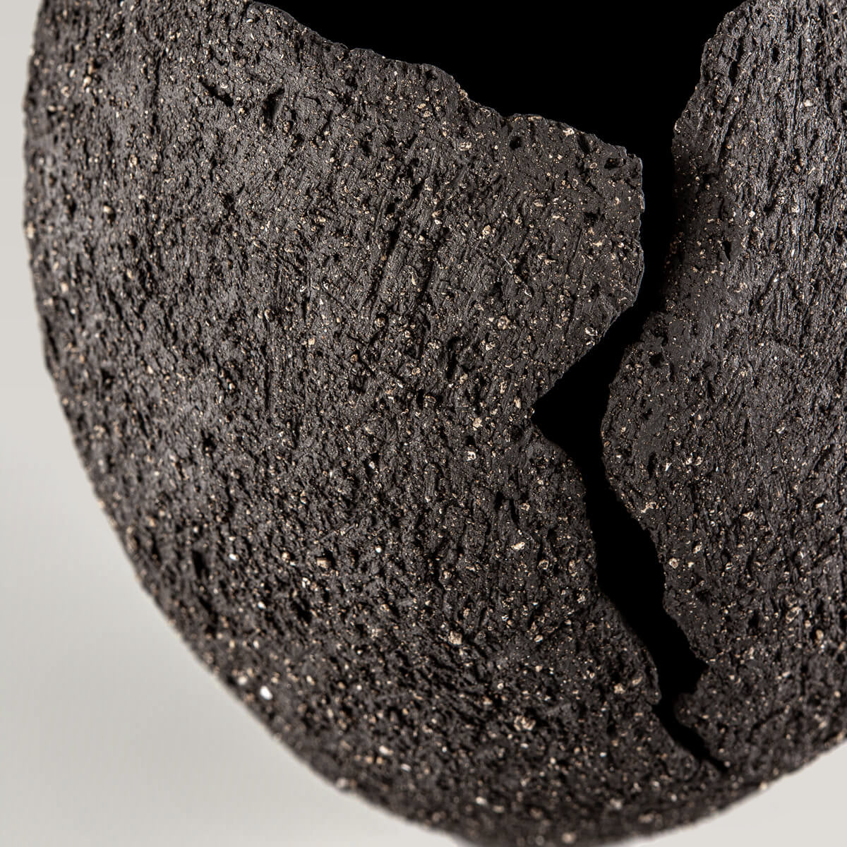 Luxury pottery vase with volcanic crack detail, perfect as collectible handmade decor.