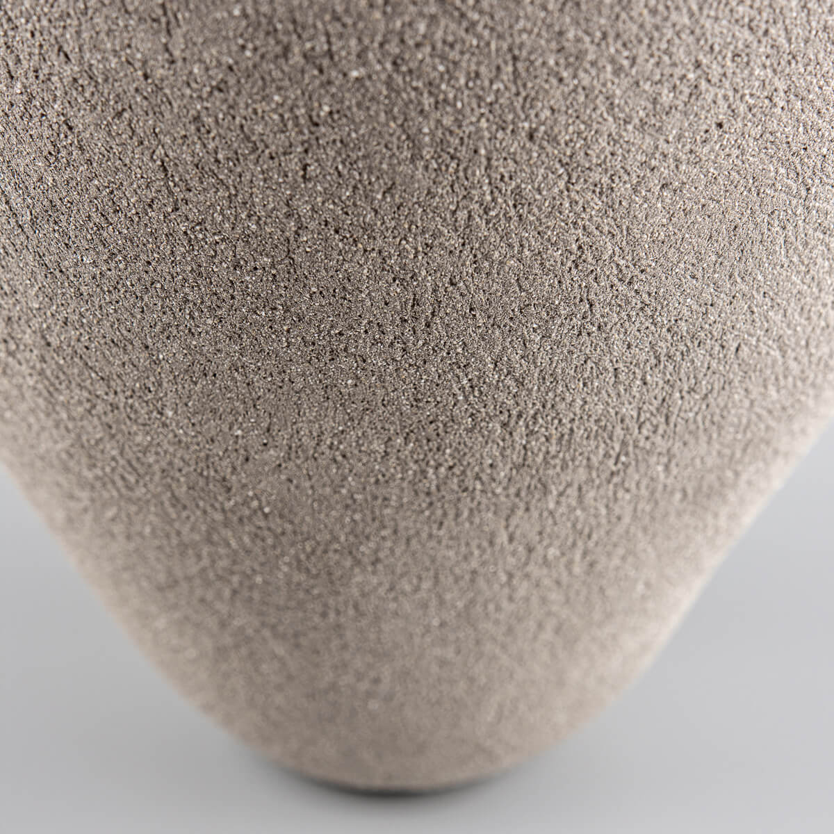 Organic handmade vases with natural clay texture for private collectors.