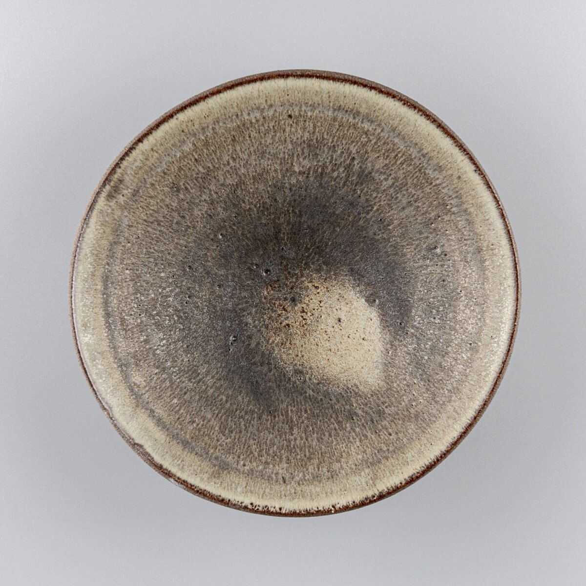 Elegant ceramic dinner plate with matte olive-green glaze, perfect for fine dining restaurants.