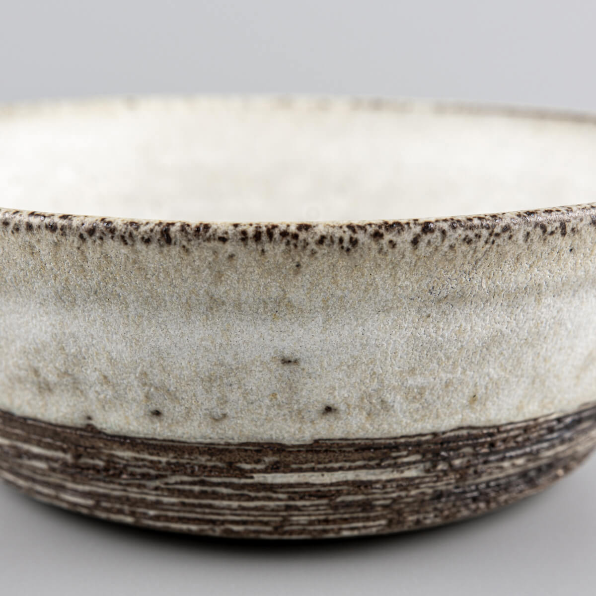 Interior view showing subtle glazing and wide functional opening of pottery bowl.