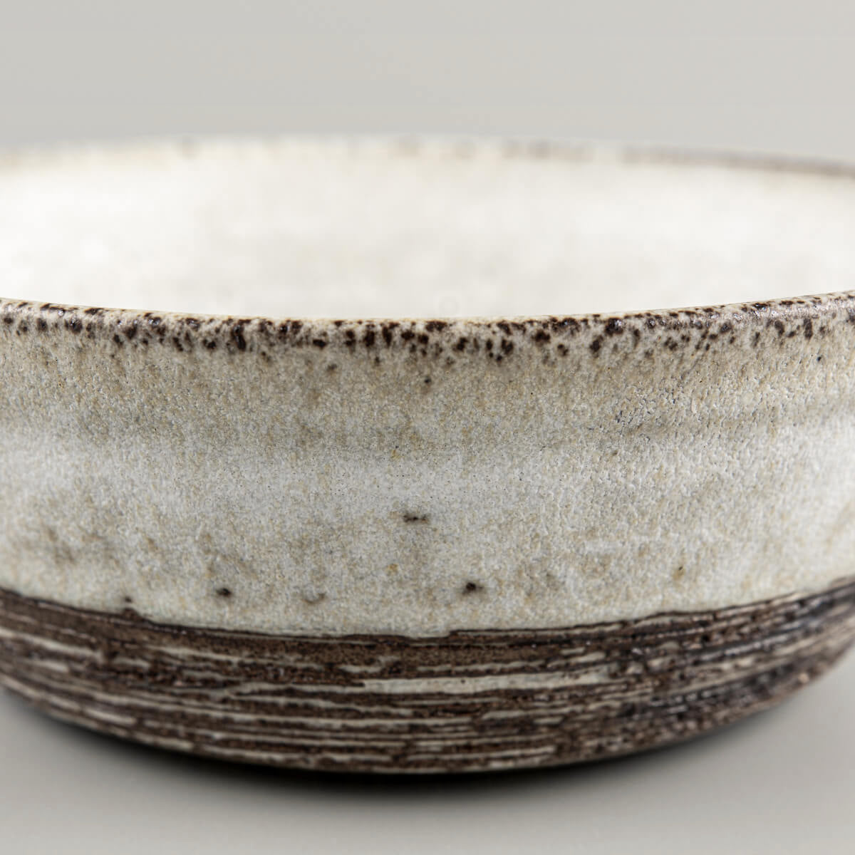 Interior view showing subtle glazing and wide functional opening of pottery bowl.