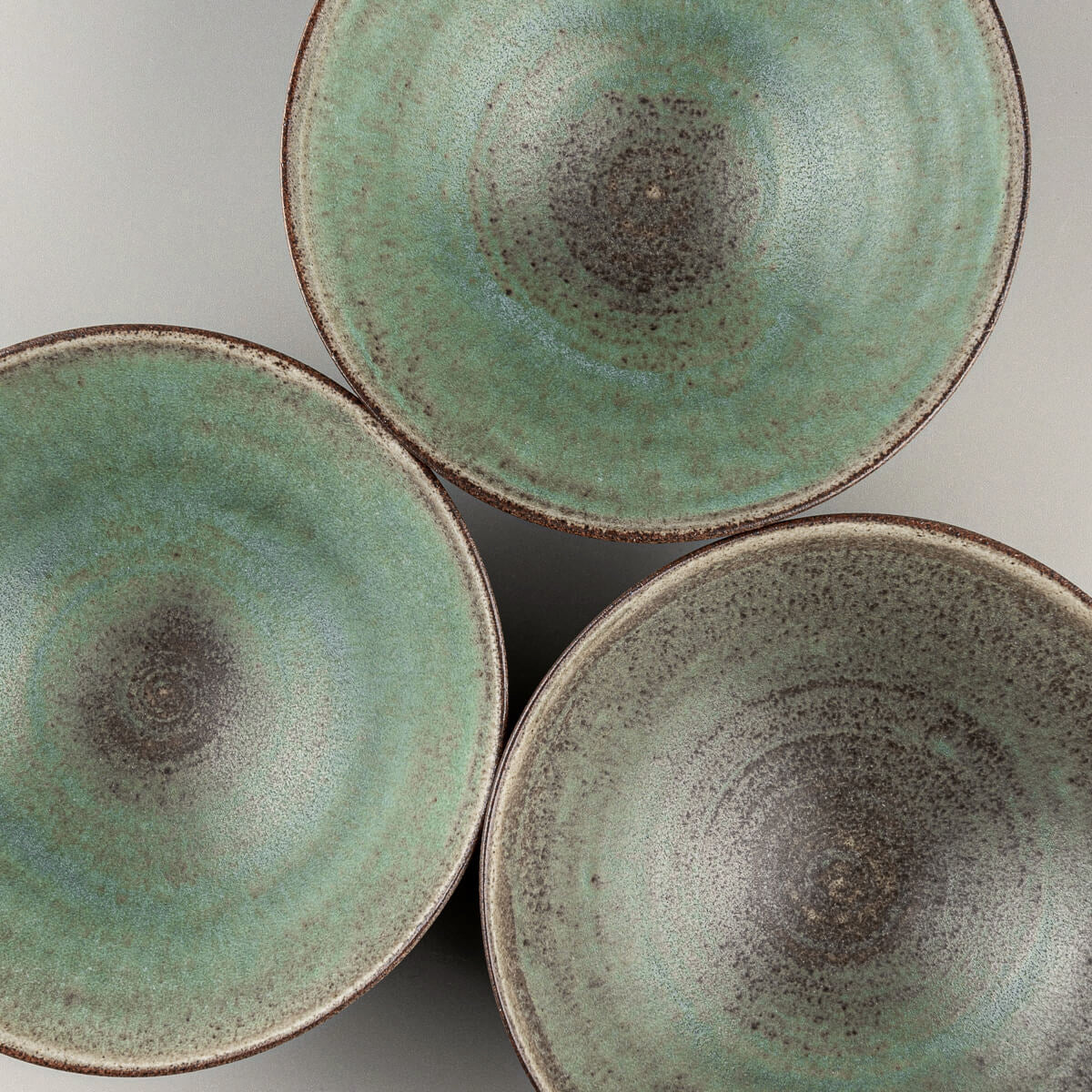 Set of handcrafted bowls ideal for boutique hotel or restaurant table settings.