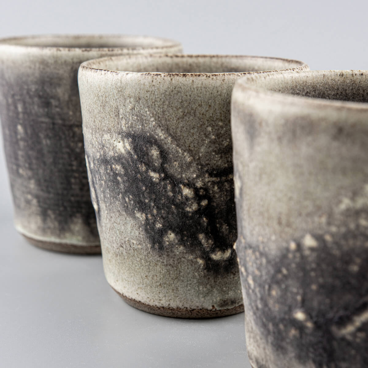 Elegant handmade pottery cups with olive-green glaze, perfect as a housewarming gift or wedding gift.