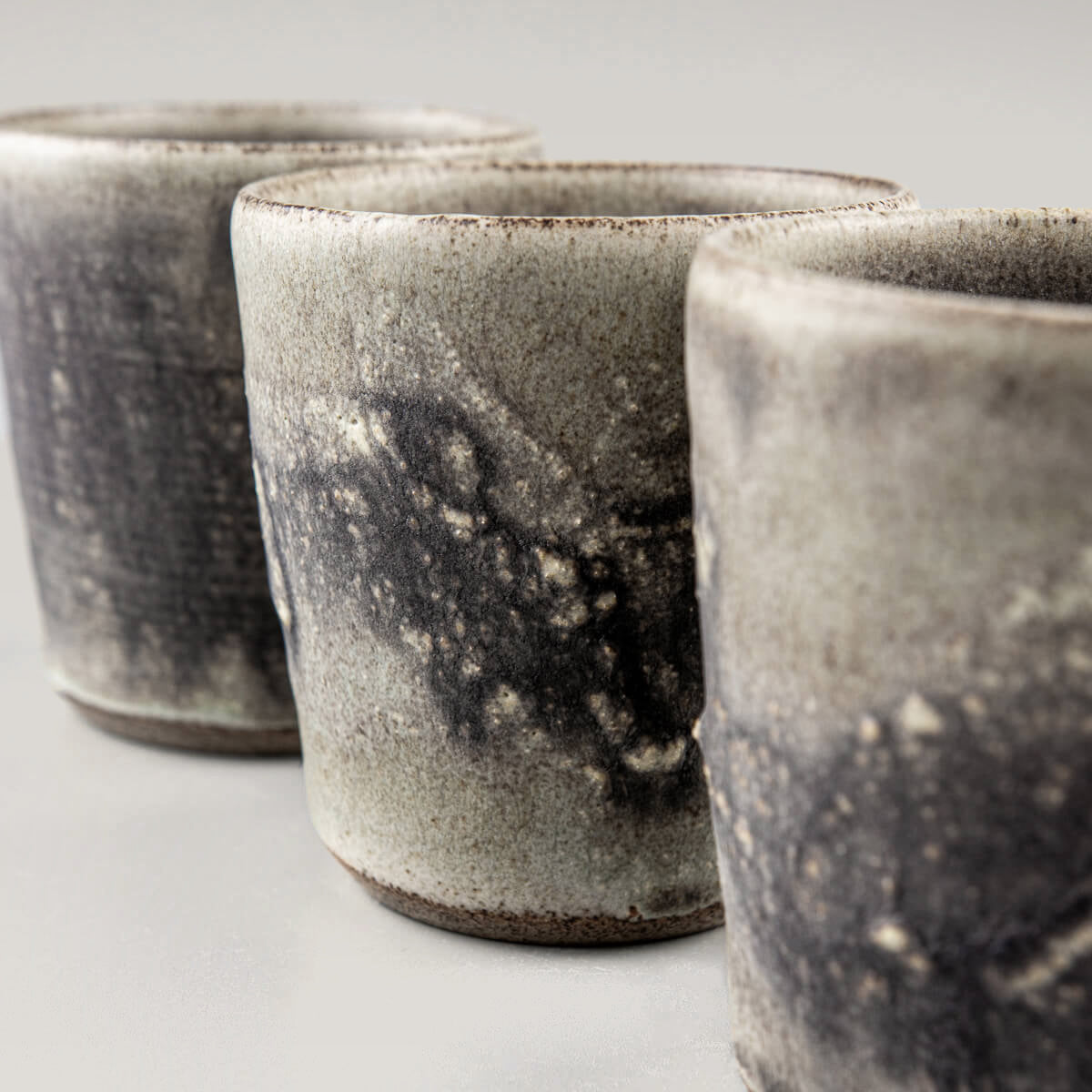 Elegant handmade pottery cups with olive-green glaze, perfect as a housewarming gift or wedding gift.