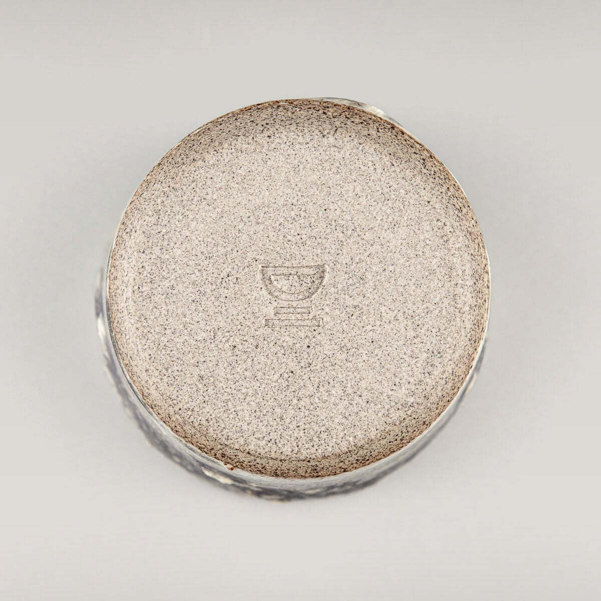 This handmade pottery cup showcases delicate craftsmanship and durable stoneware for everyday use.