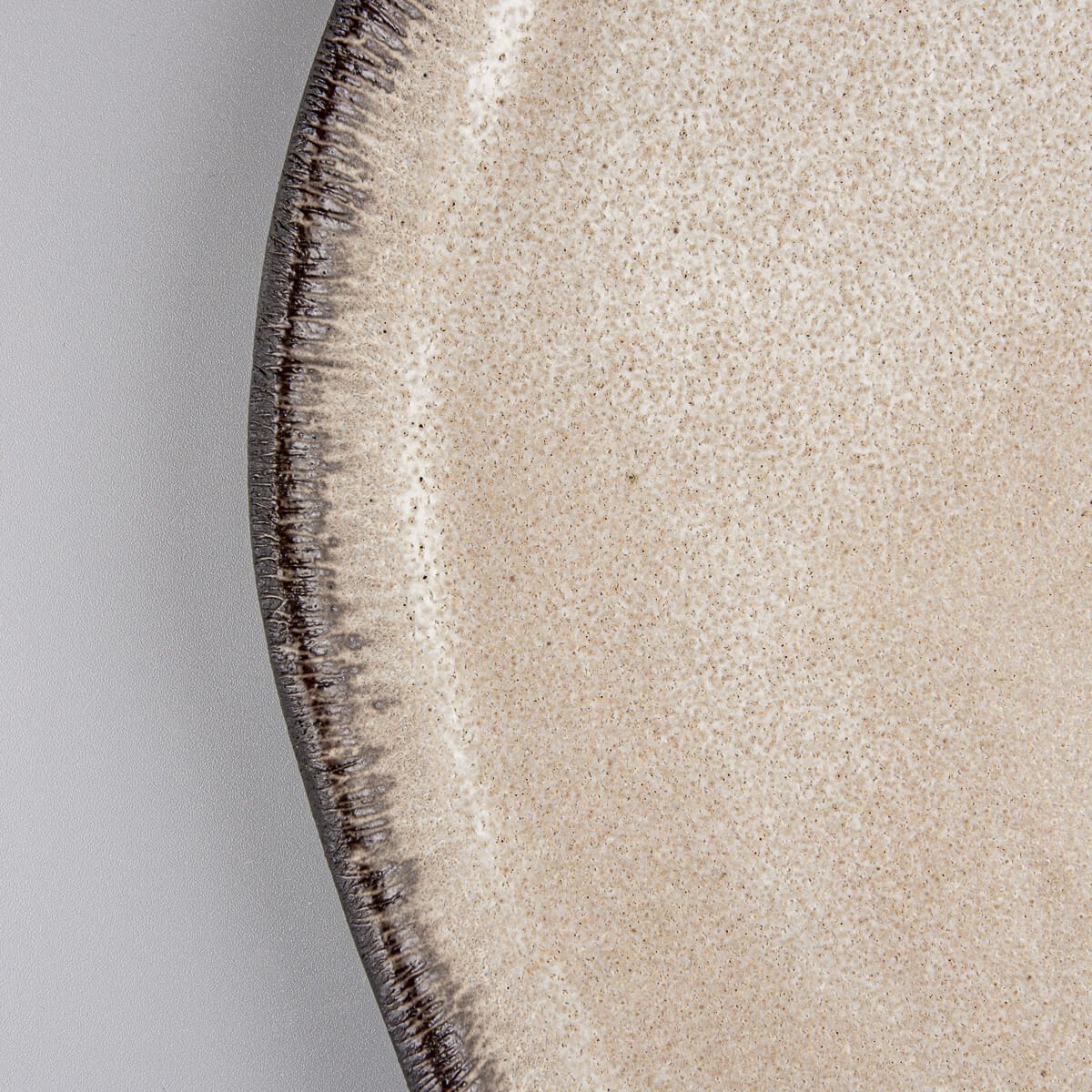 Detailed view of fine ceramic craftsmanship for upscale restaurant plating.