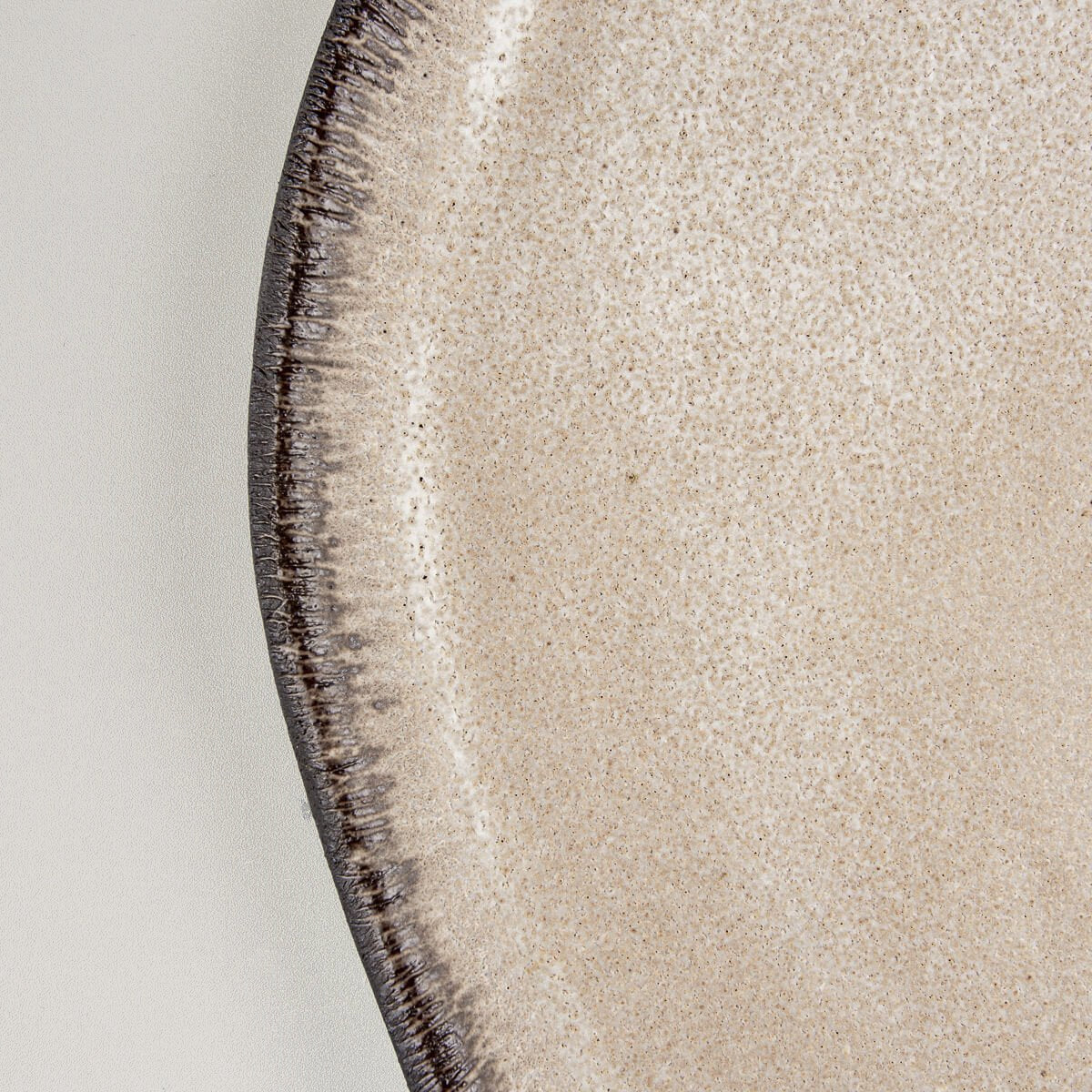 Detailed view of fine ceramic craftsmanship for upscale restaurant plating.