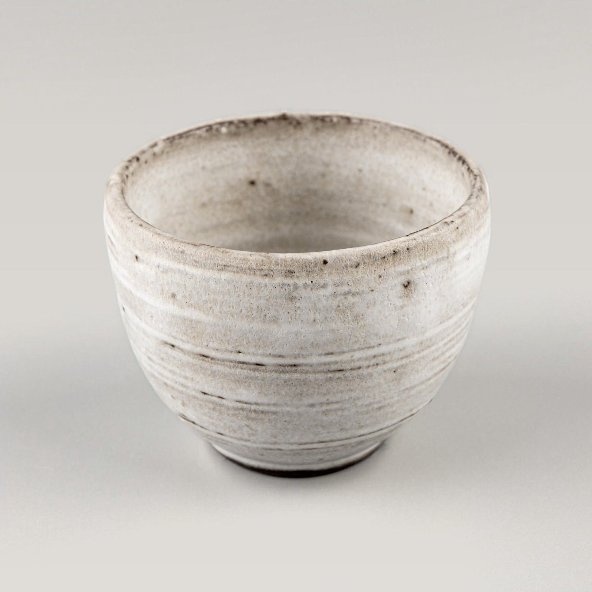 Elegant handcrafted coffee mugs with matte glaze finish, perfect for enjoying espresso, cappuccino, or matcha tea.