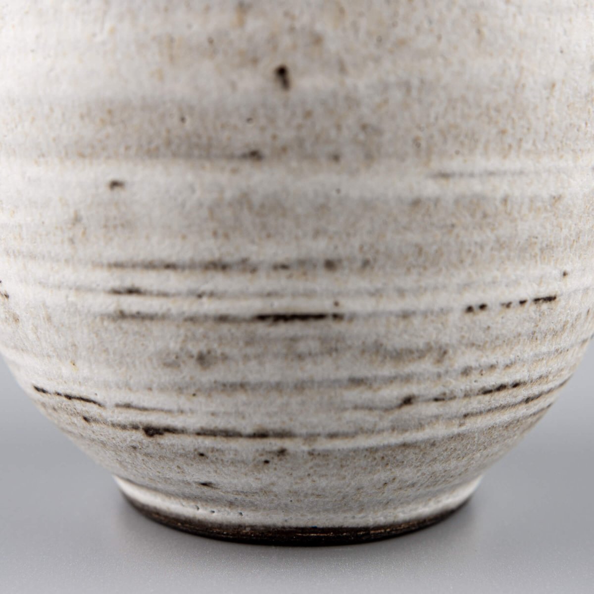 White glazed coffee mug with artisan finish, handcrafted for fine dining and culinary presentation.