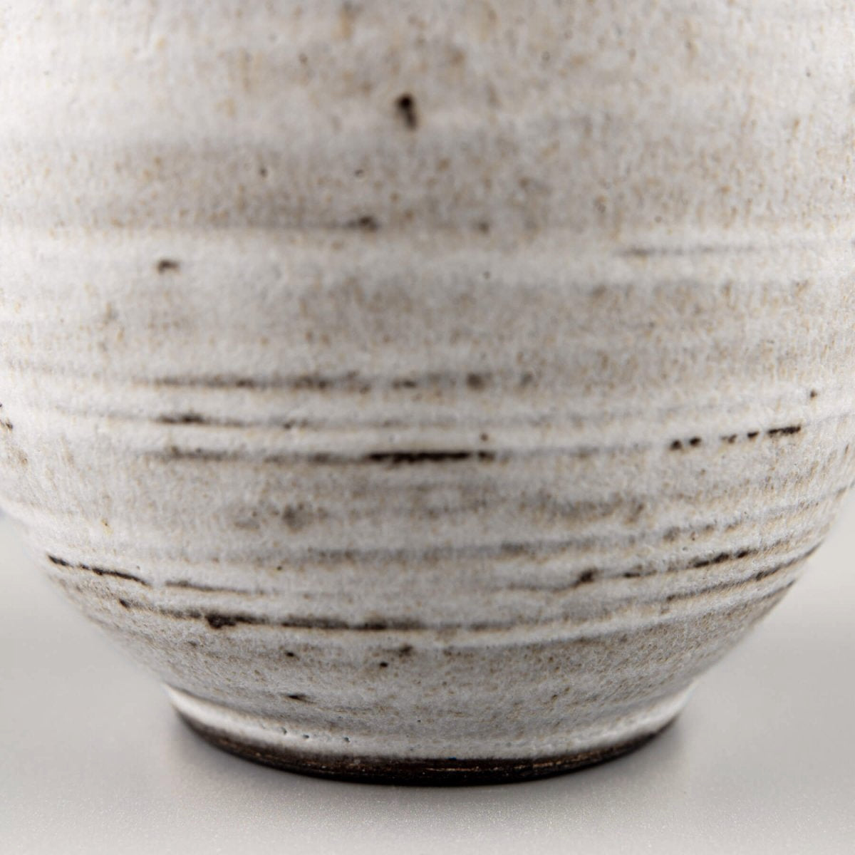 White glazed coffee mug with artisan finish, handcrafted for fine dining and culinary presentation.