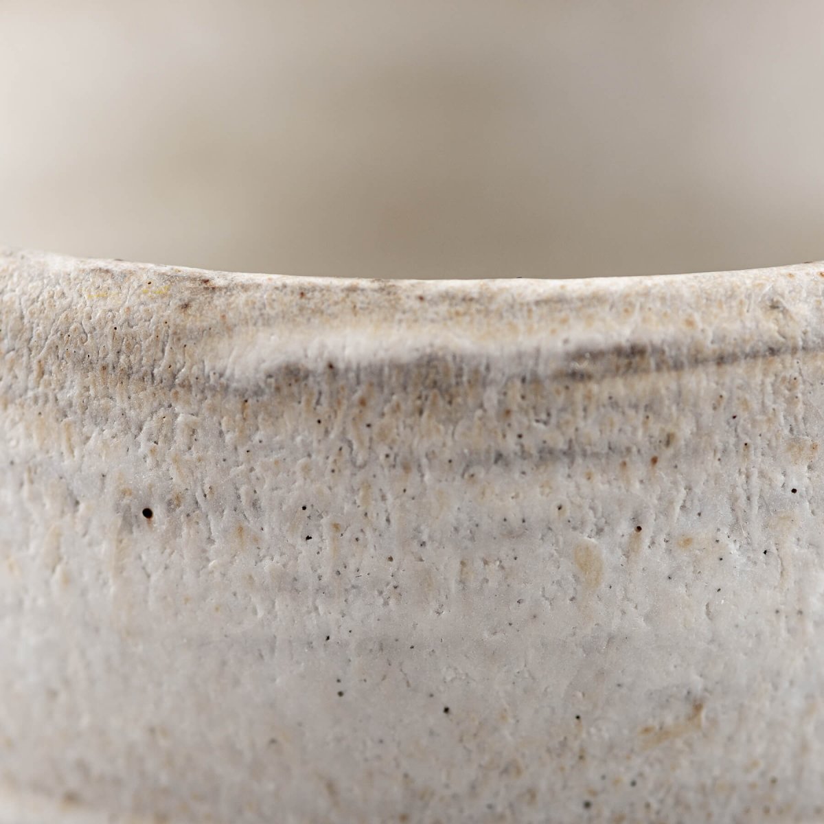 Handcrafted ceramic coffee mug with natural clay tones and elegant matte glaze, ideal for daily rituals.