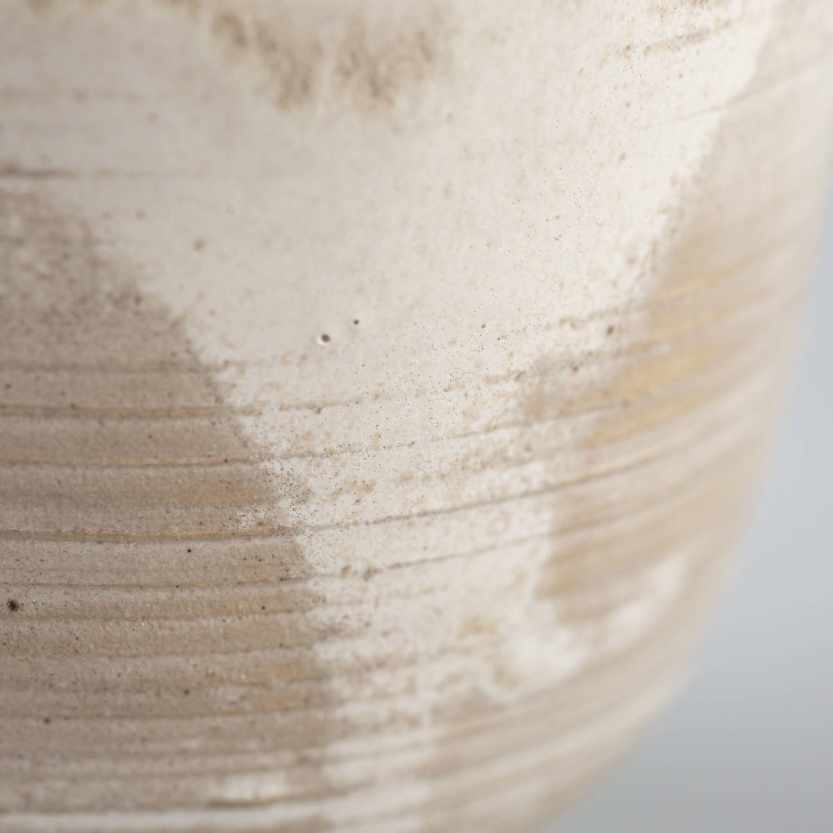 Interior detail of a handcrafted stoneware coffee cup, suitable for home or restaurant kitchenware.