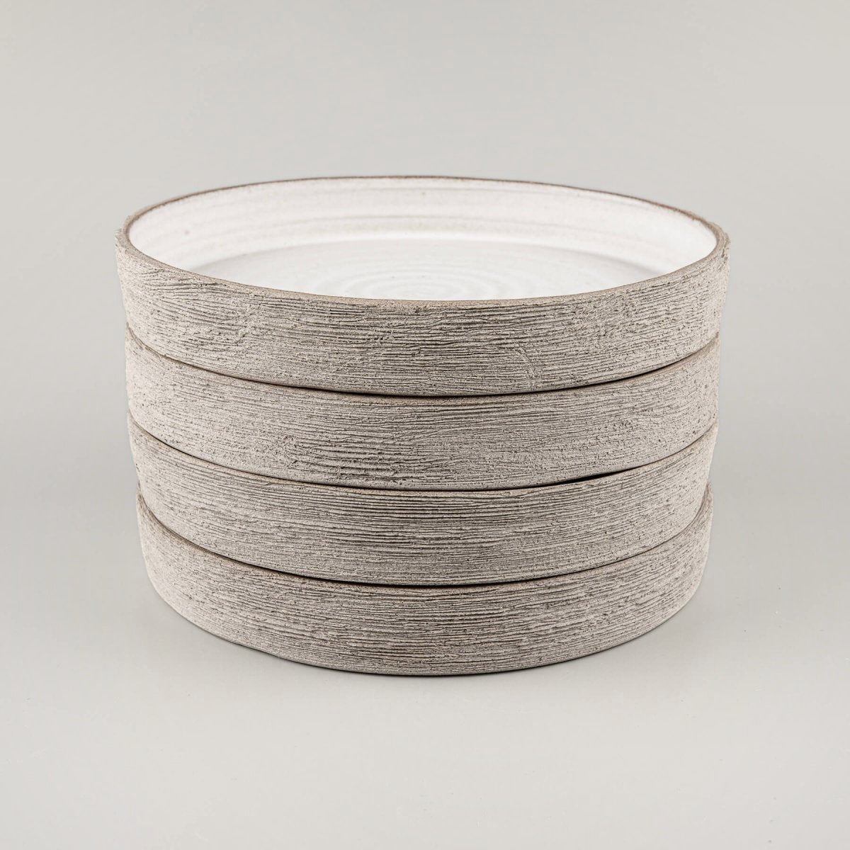 Luxury artisan stoneware plates for boutique hotel and fine dining restaurants.