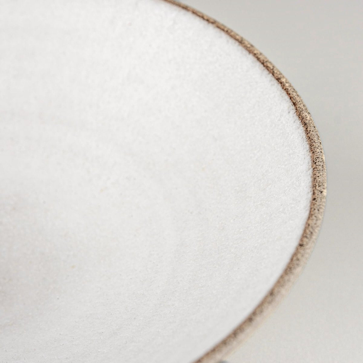 Close-up of rim showcasing craftsmanship and glaze transition in handcrafted bowl.