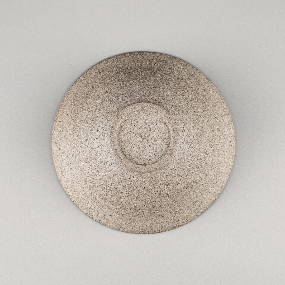 Bottom view of handmade bowl, perfect for collectible pottery collections.