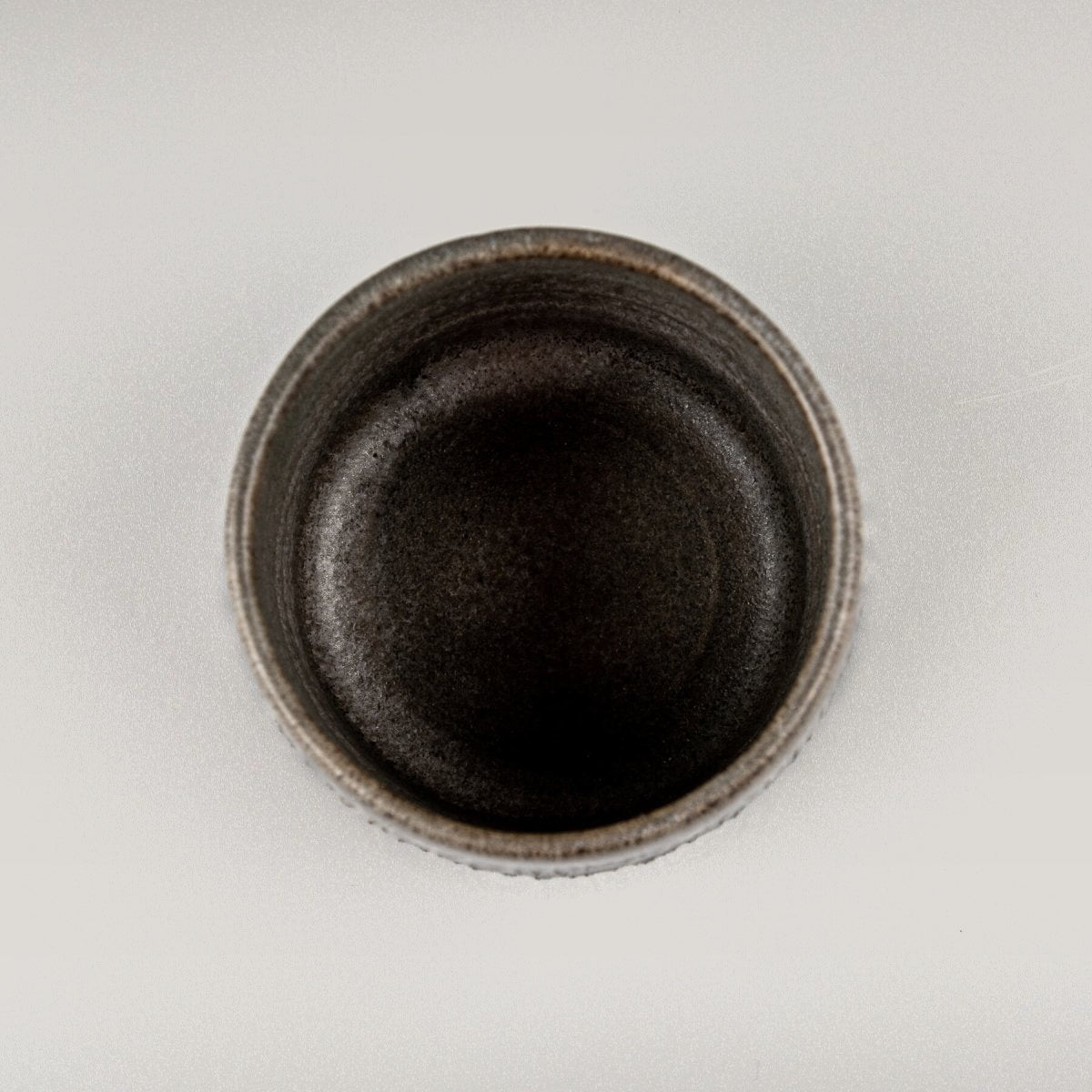 Rustic ceramic coffee cups with matte glaze finish, crafted for boutique hotel dining and stylish home tableware.
