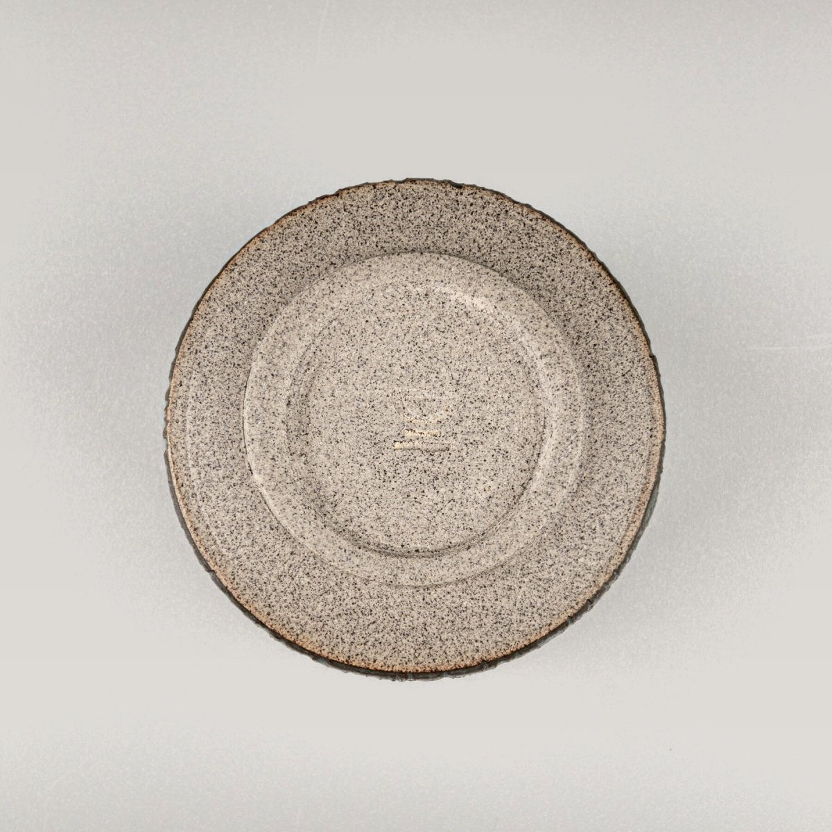 ChatGPT said:
Handcrafted stoneware coffee cups base with circular carved texture, ceramic detail for collectible pottery.