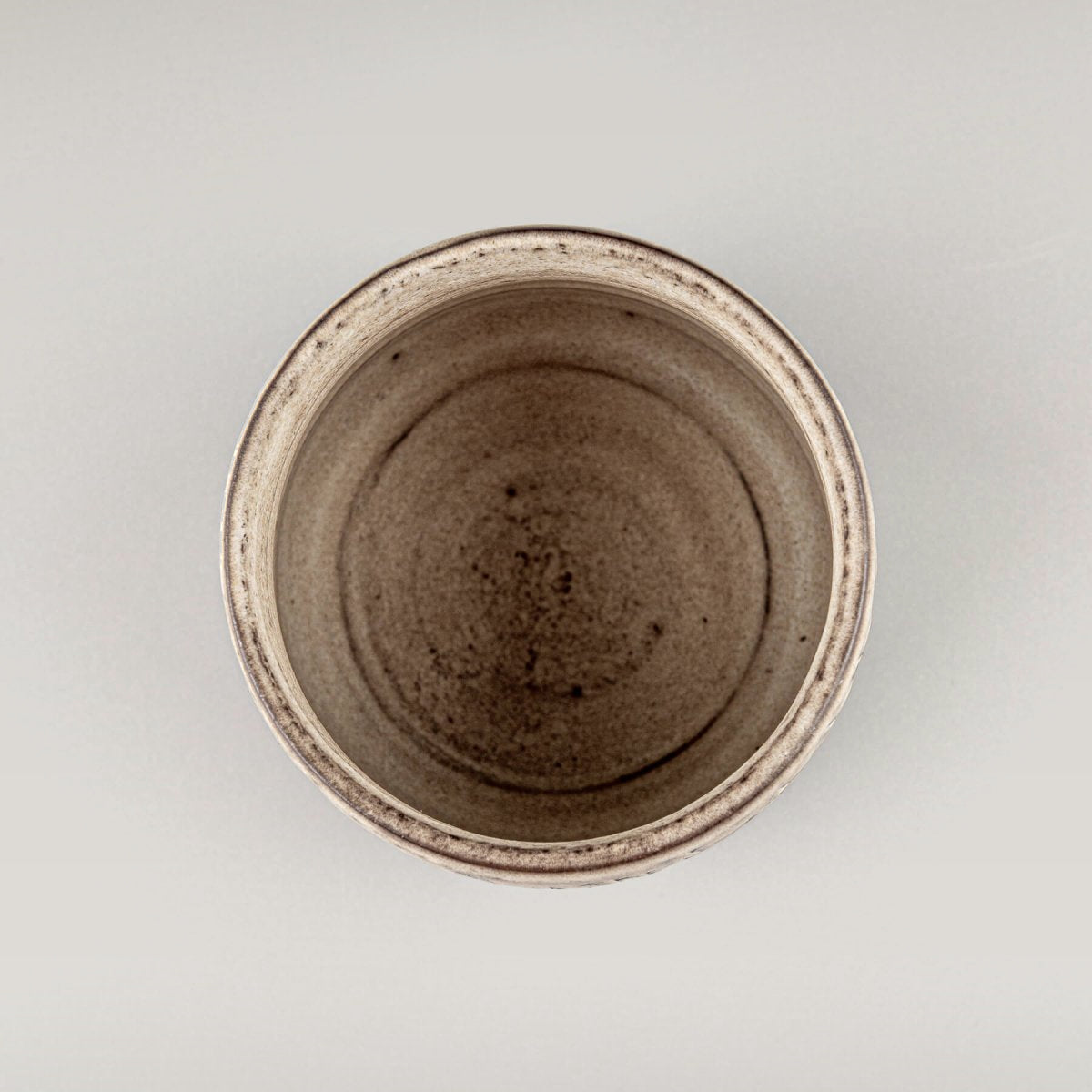 Top view of a handcrafted ceramic mug showing smooth interior and matte glaze finish.