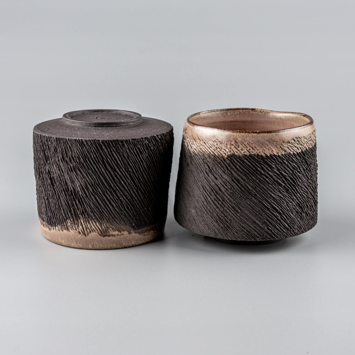 Pottery mugs set with carved diagonal texture and unique handmade design, perfect gift idea and collectible pottery.