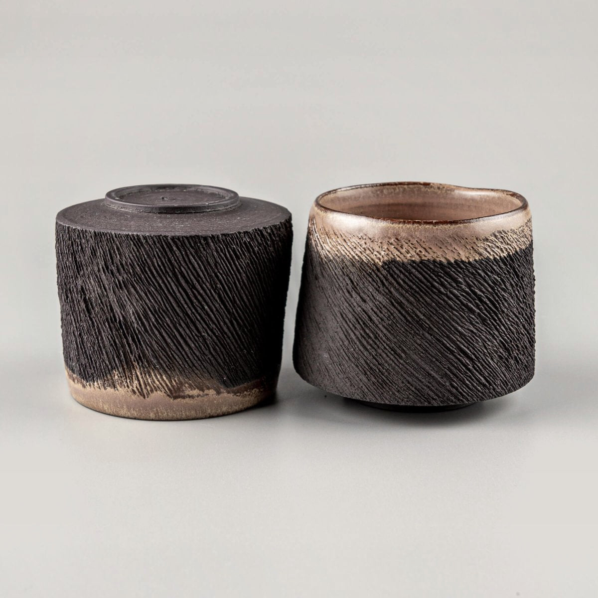 Pottery mugs set with carved diagonal texture and unique handmade design, perfect gift idea and collectible pottery.