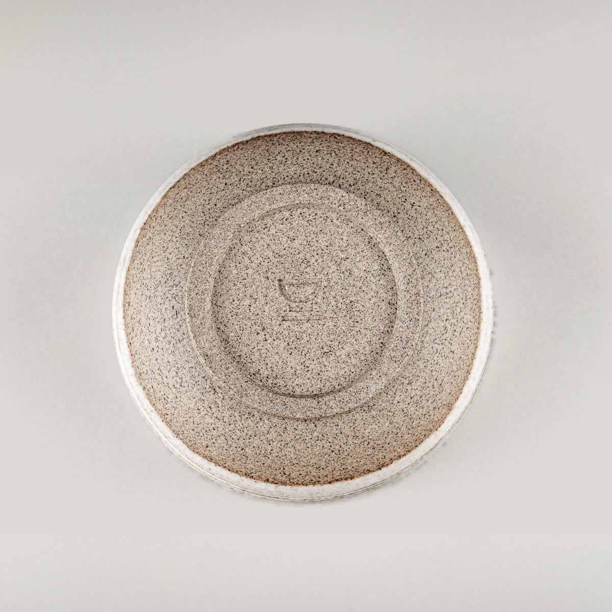 Top view of pottery mug showing natural clay texture and handmade craftsmanship.