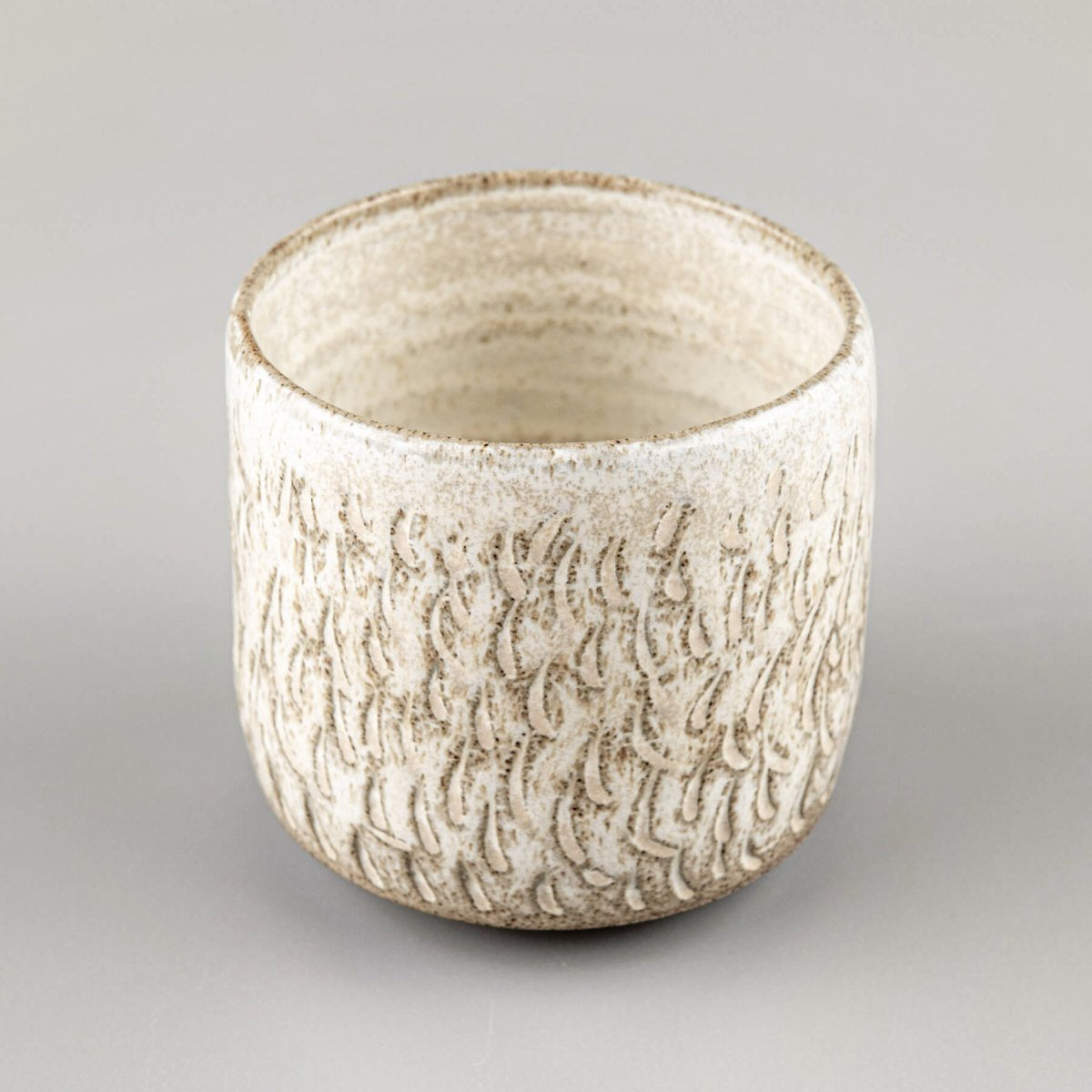 Interior view of a handmade ceramic espresso cup with natural matte glaze.