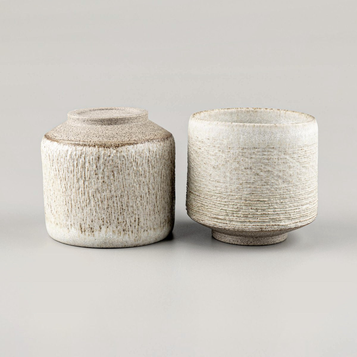 Fine carving on ceramic mugs, perfect for private collectors and home decor.