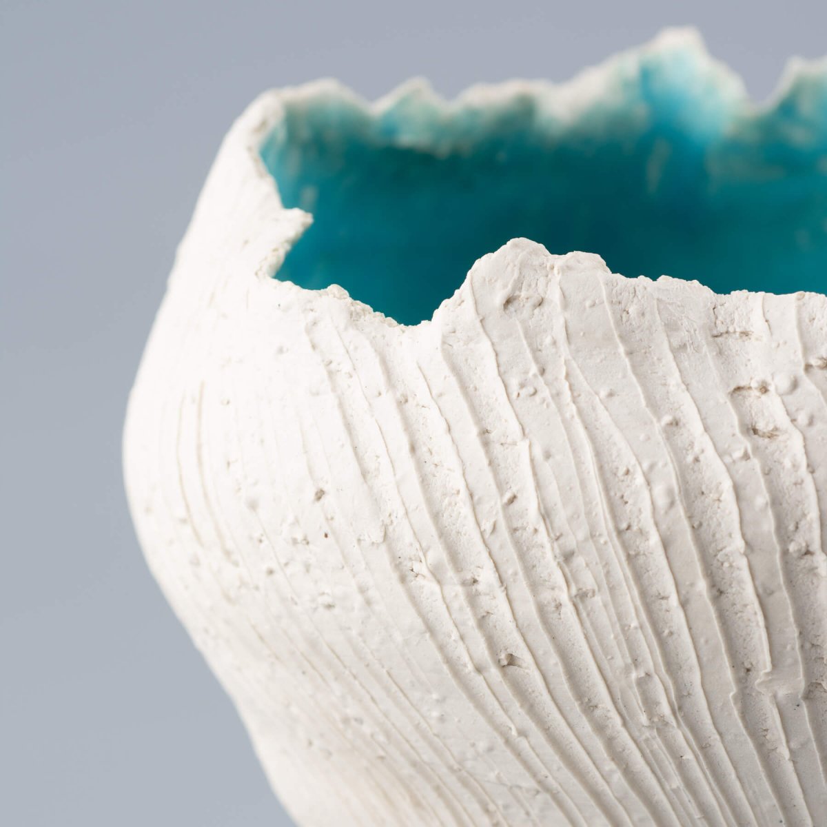 Luxury stoneware vase featuring a handcrafted white texture and a glossy turquoise interior, perfect for wedding gift ideas.