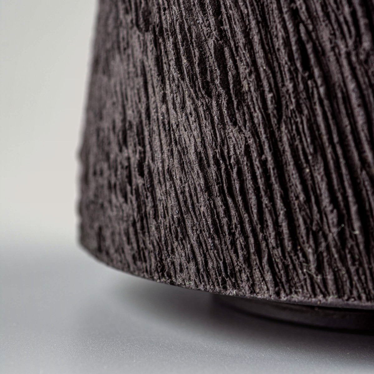 Detailed pottery mug carved texture in black stoneware, ideal for fine dining and collectible handmade ceramics.