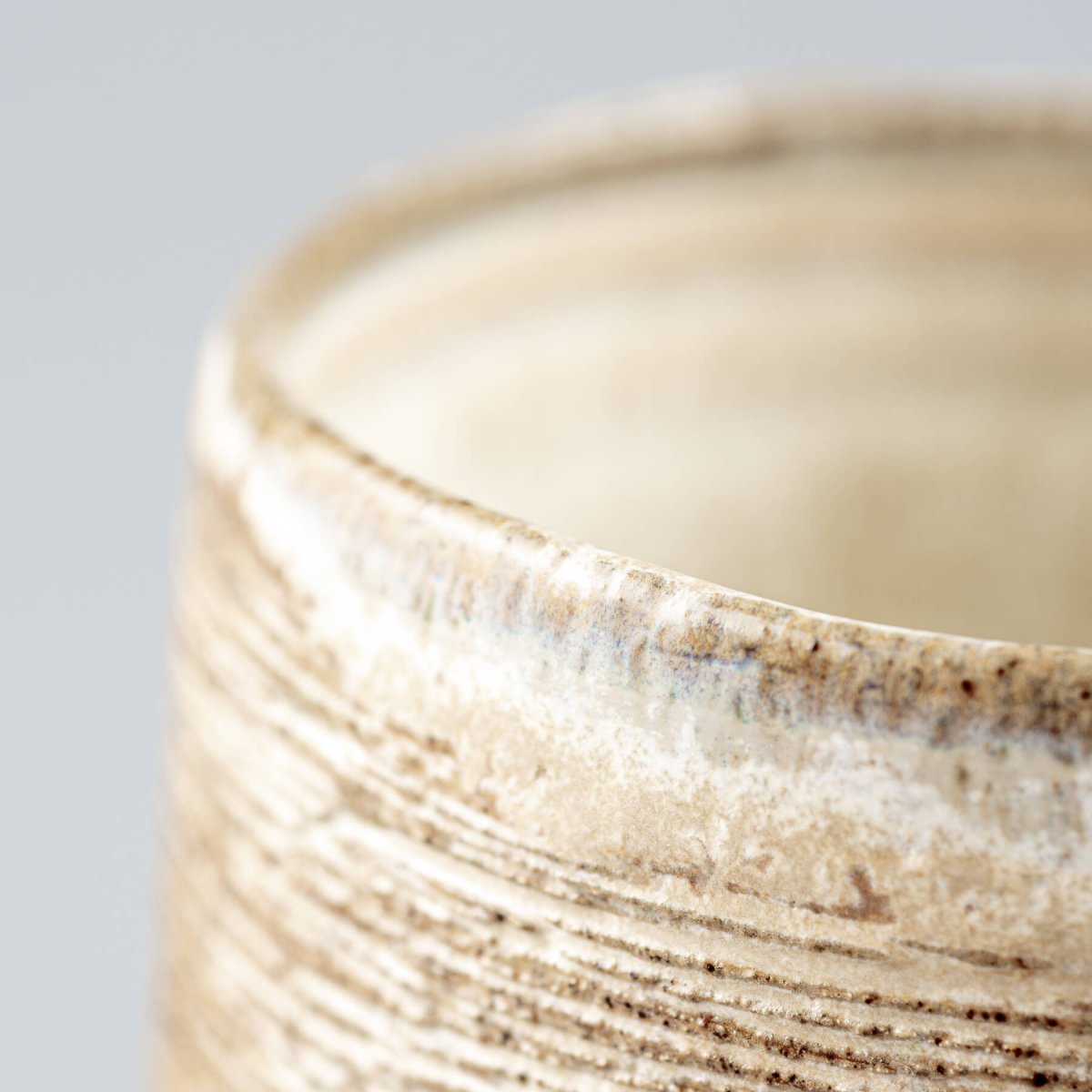 Artisan ceramic mugs with unique carvings, fine dining tableware and handmade décor essentials.